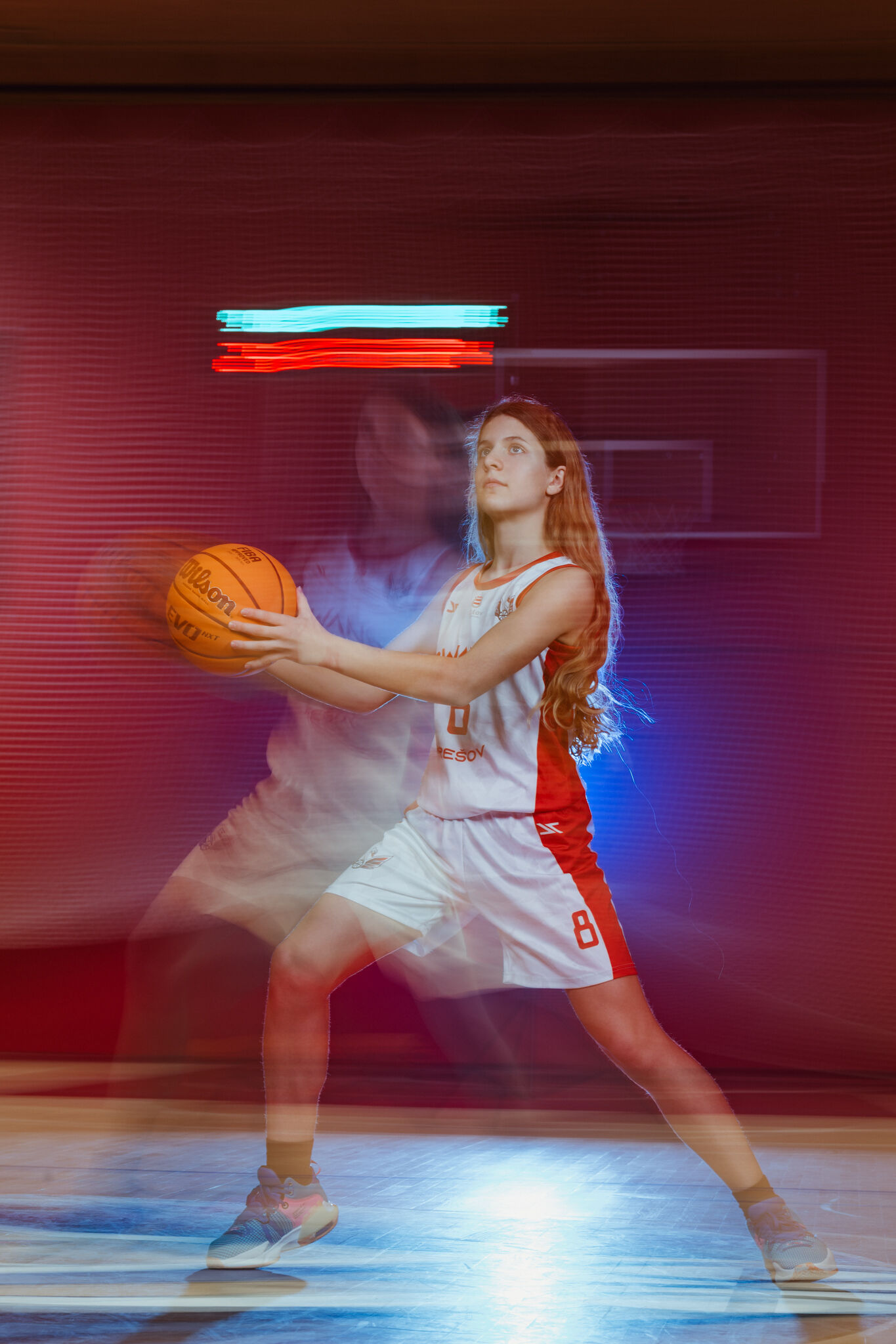 Girls practicing basketball drills